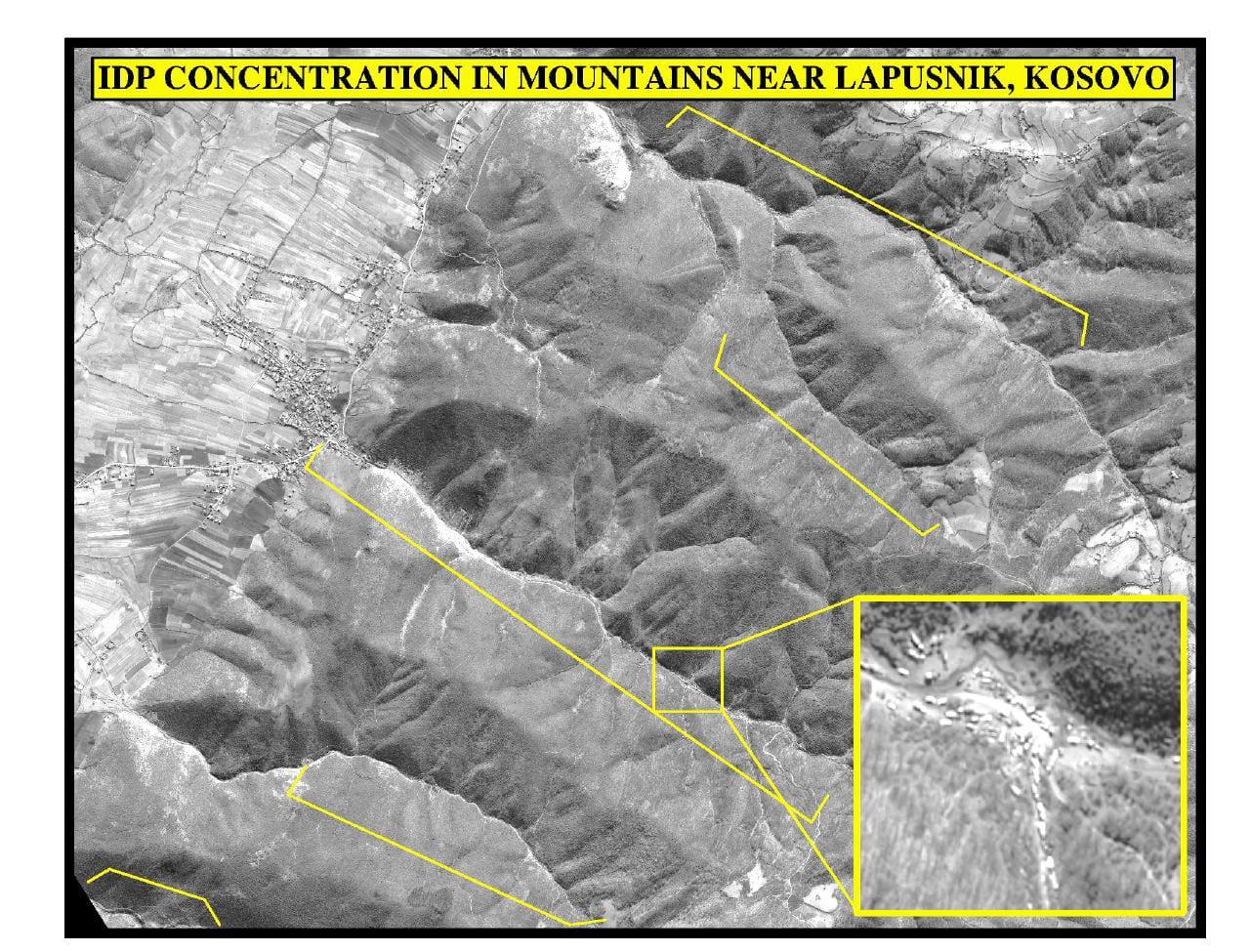 Black-and-white aerial image of mountainous terrain with yellow annotations.