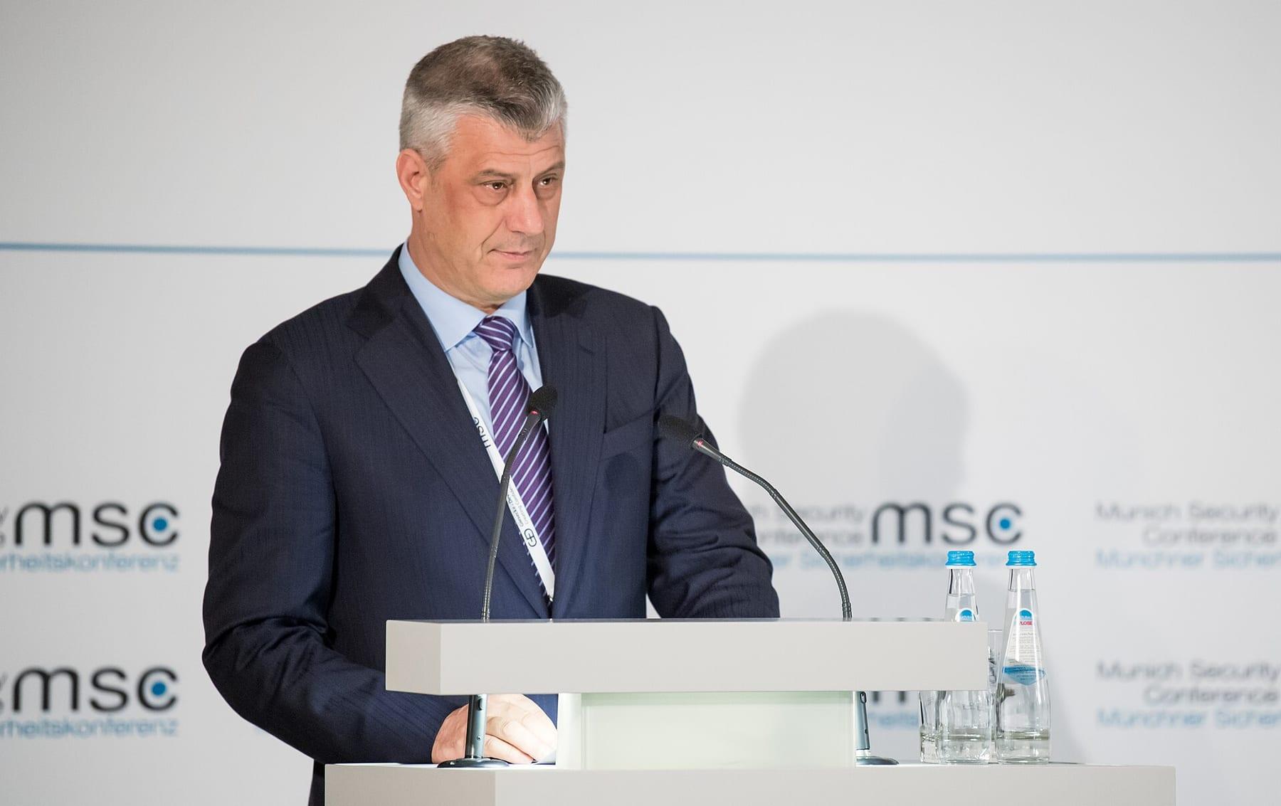 Man in a dark suit speaking at a lectern with the MSC conference logo behind him.